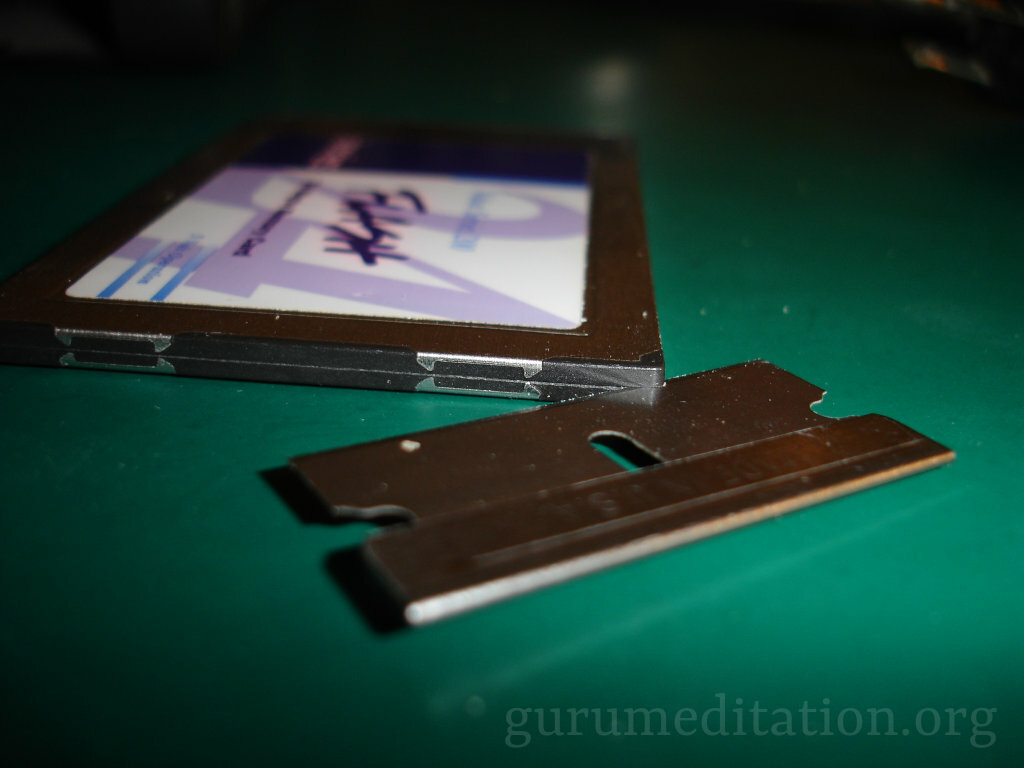 Razor blade to split PCMCIA case